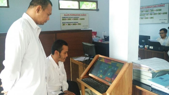 ID 00547: Desa Triharjo Usung Inovasi Pelayanan Publik Prima Lewat Program Layanan 1 Menitan